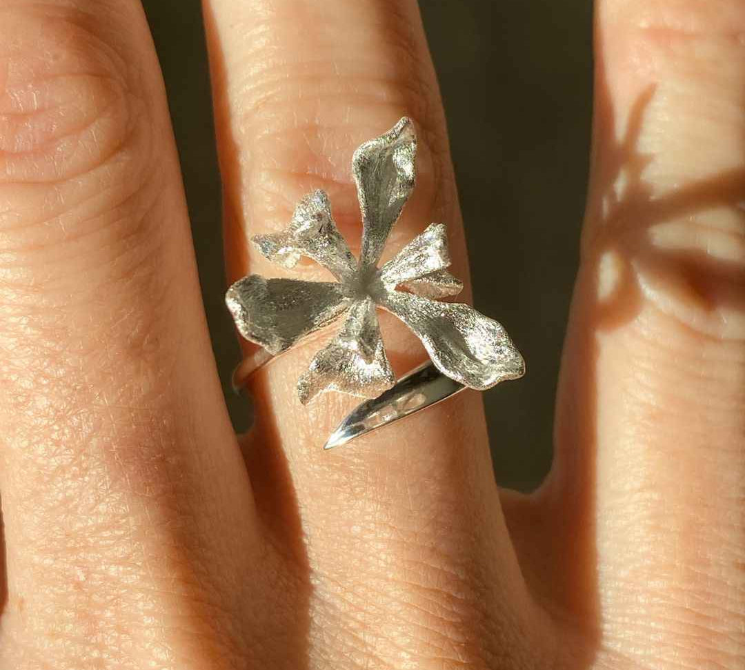 Top view of the sterling silver Iris cocktail ring, a symbol of understated elegance and the quiet luxury trend.