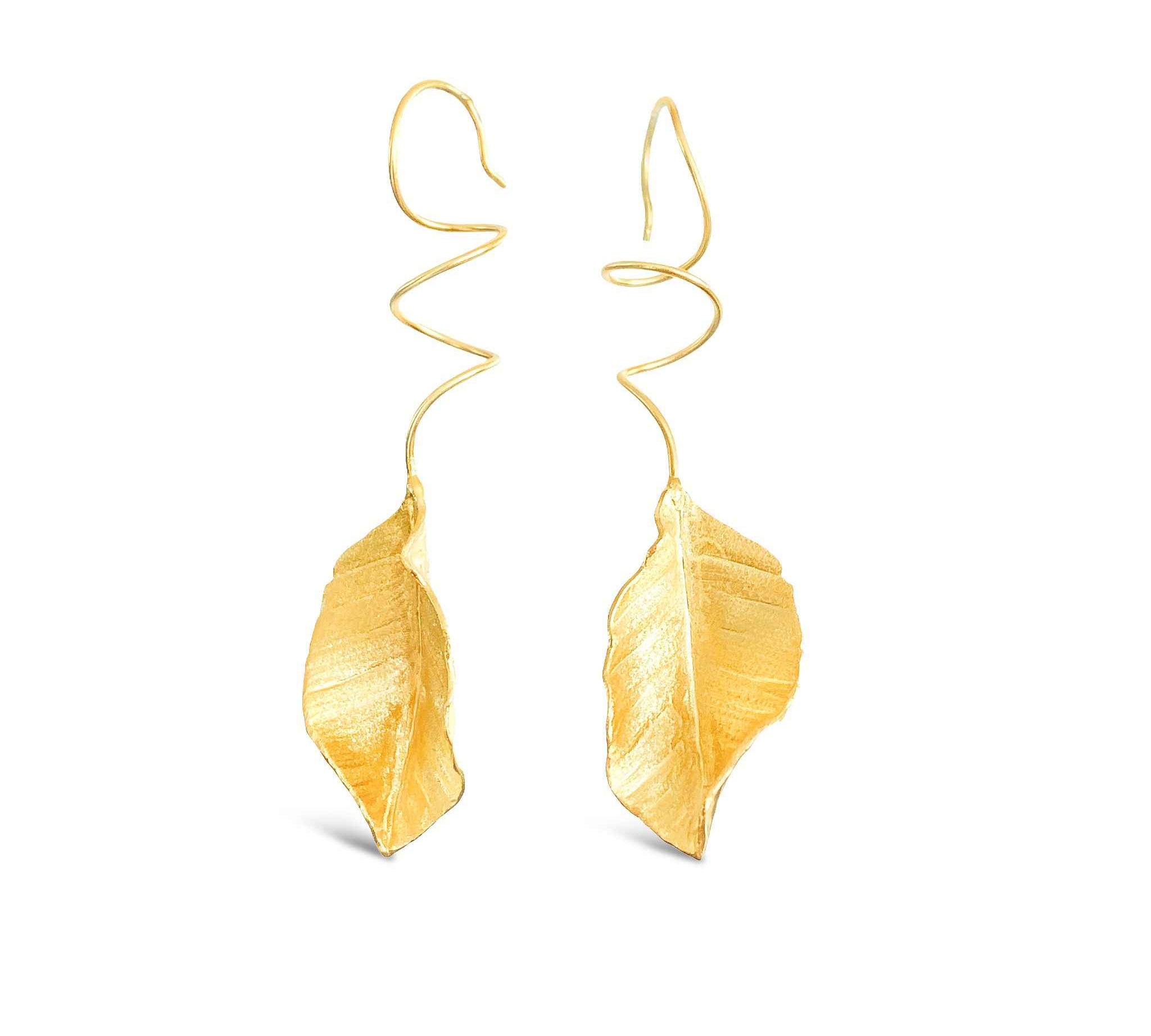 Elegant sterling silver leaf drop earrings by Alessandra James, handcrafted with attention to detail.