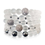 Stacked set of 5 frosted gunmetal pave bracelet with hematite accents by Alessandra James.