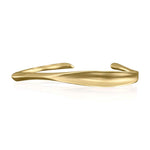 Elegant 18k gold plated Wave Bangle by Alessandra James, perfect for the quiet luxury trend.