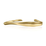 Elegant 18k gold plated Wave Bangle by Alessandra James, perfect for the quiet luxury trend.