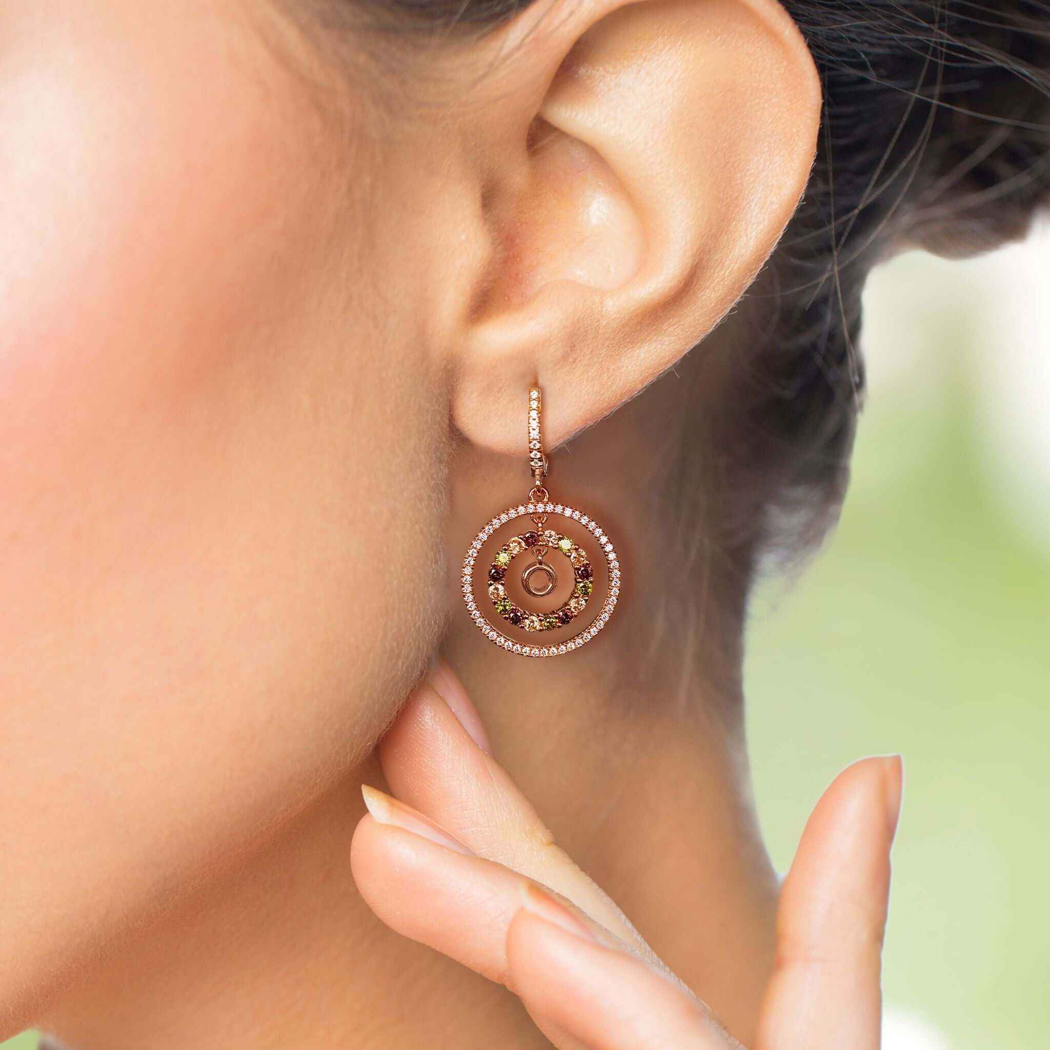Close-up view of Halo Drop Earrings showcasing the intricate cubic zirconia detailing and rose gold finish.