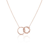 Elegant Interlocking Rings Necklace in a quiet luxury style by Alessandra James.