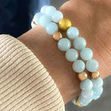 Unique aquamarine bracelets with genuine aquamarine beads and gold detailing.