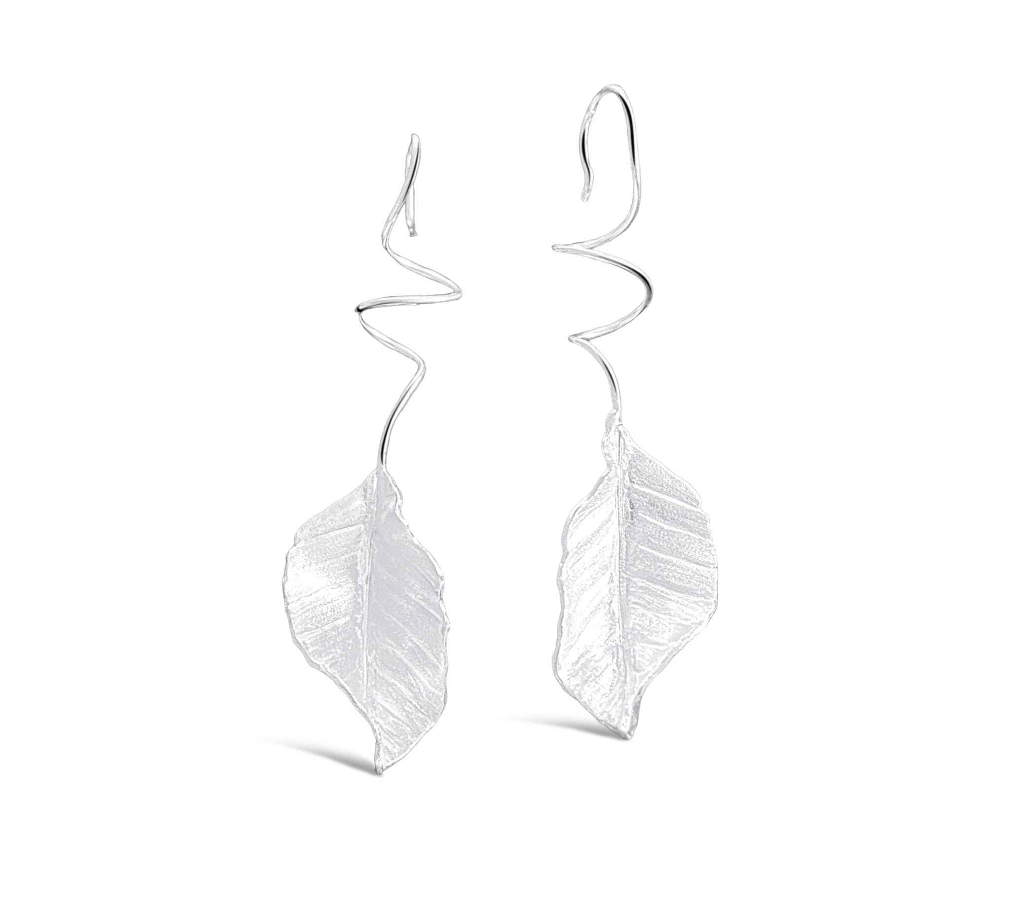 Elegant sterling silver leaf drop earrings by Alessandra James, handcrafted with attention to detail.