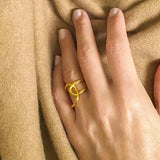 Stylish Asymmetric Twist Ring worn with sophisticated elegance.