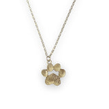 Close-up view of the back of the sterling silver Paw Print Pendant, a perfect accessory for pet lovers.