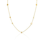 Elegant opera-length Pebble Necklace in Gold by Alessandra James, adorned with irregularly spaced round pebbles.