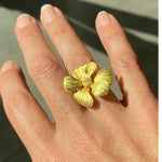 Close-up view of gold Peony Cocktail Ring showcasing petal detailing from Alessandra James.