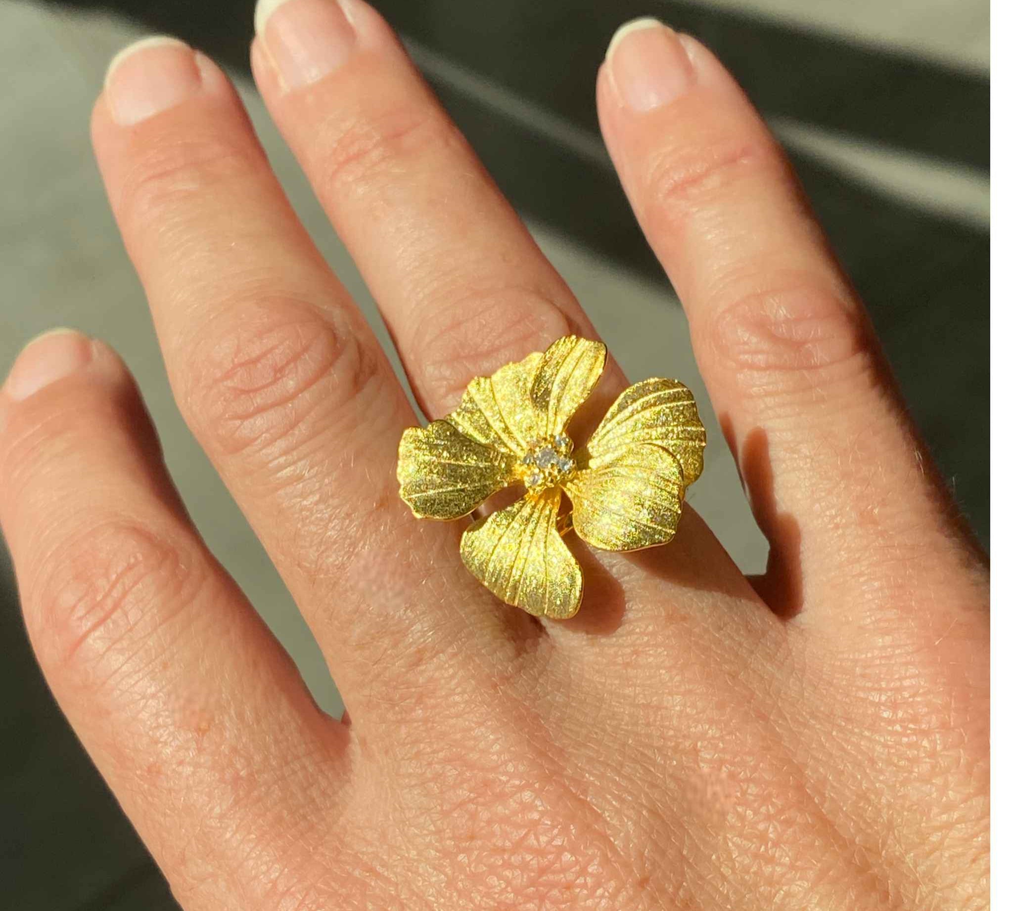Close-up view of gold Peony Cocktail Ring showcasing petal detailing from Alessandra James.