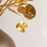 Close-up view of the intricate Peony Pendant in Gold - timeless jewelry piece by Alessandra James.