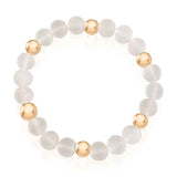 Feminine Rose Quartz Bracelet with gold spacers by Alessandra James.