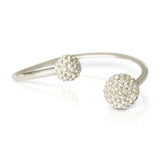 Sophisticated sterling silver arm bangle with sparkling shambala ball ends for ladies by Alessandra James.