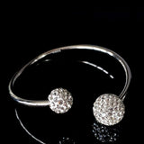 Detailed view of high-quality cubic zirconia on silver Shambala Ball Arm Bangle by Alessandra James.