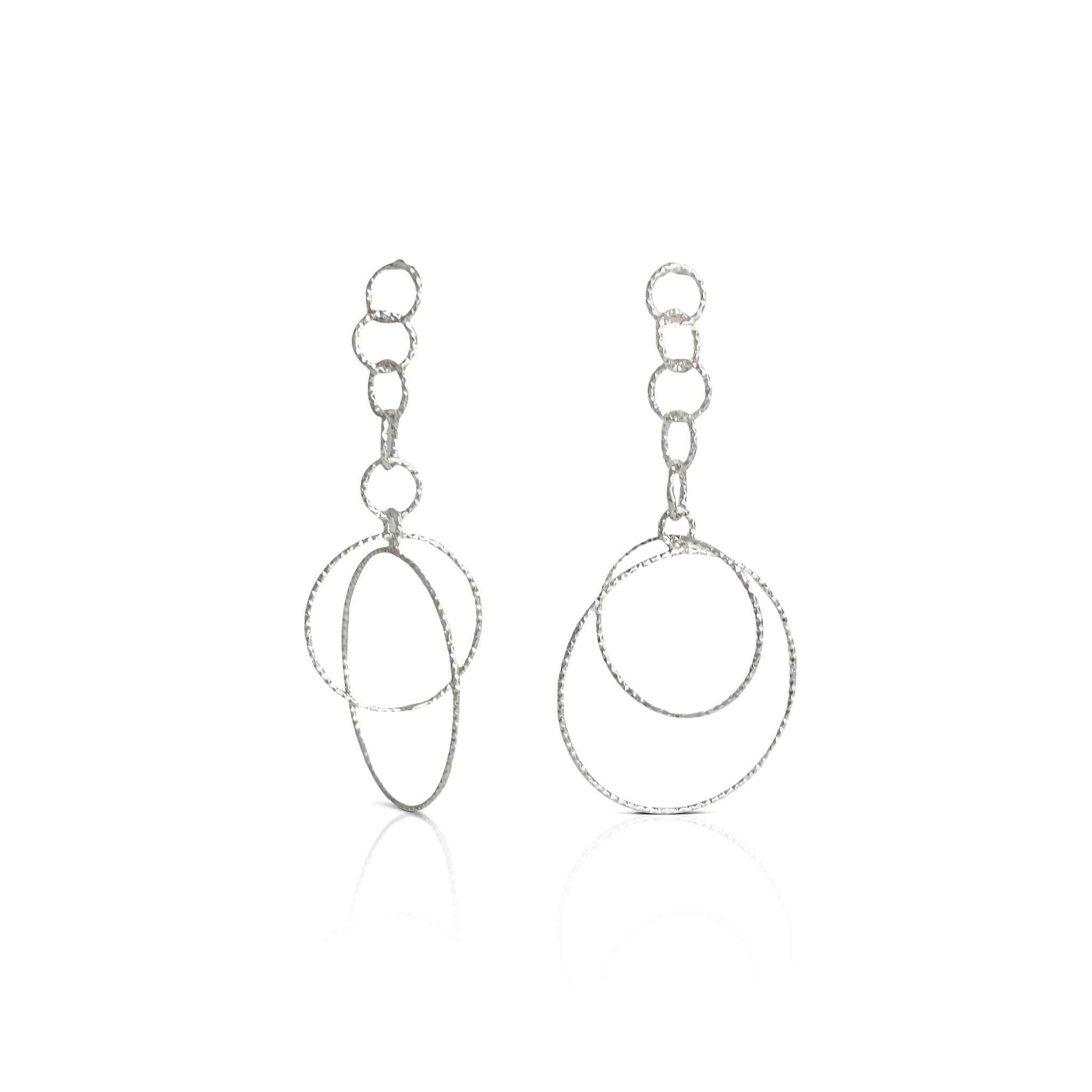 Shimmering Chain Drop Earrings in Silver by Alessandra James, showcasing interlacing rings.