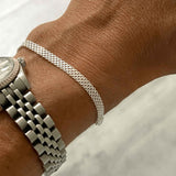 Detailed view of the sterling silver mesh bracelet for women, showcasing its intricate design.