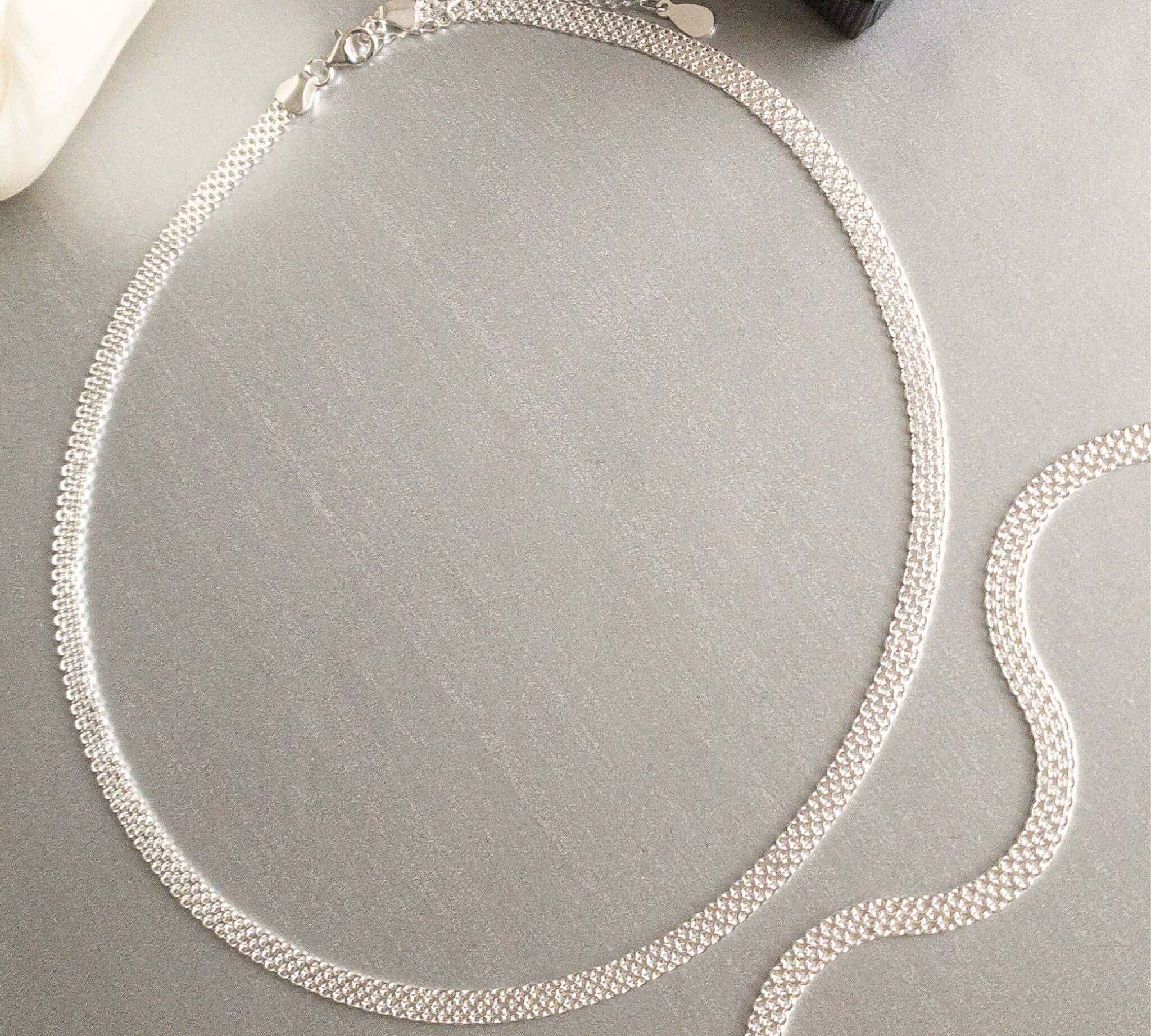 Close-up of chic Silver Mesh Choker Necklace by Alessandra James.