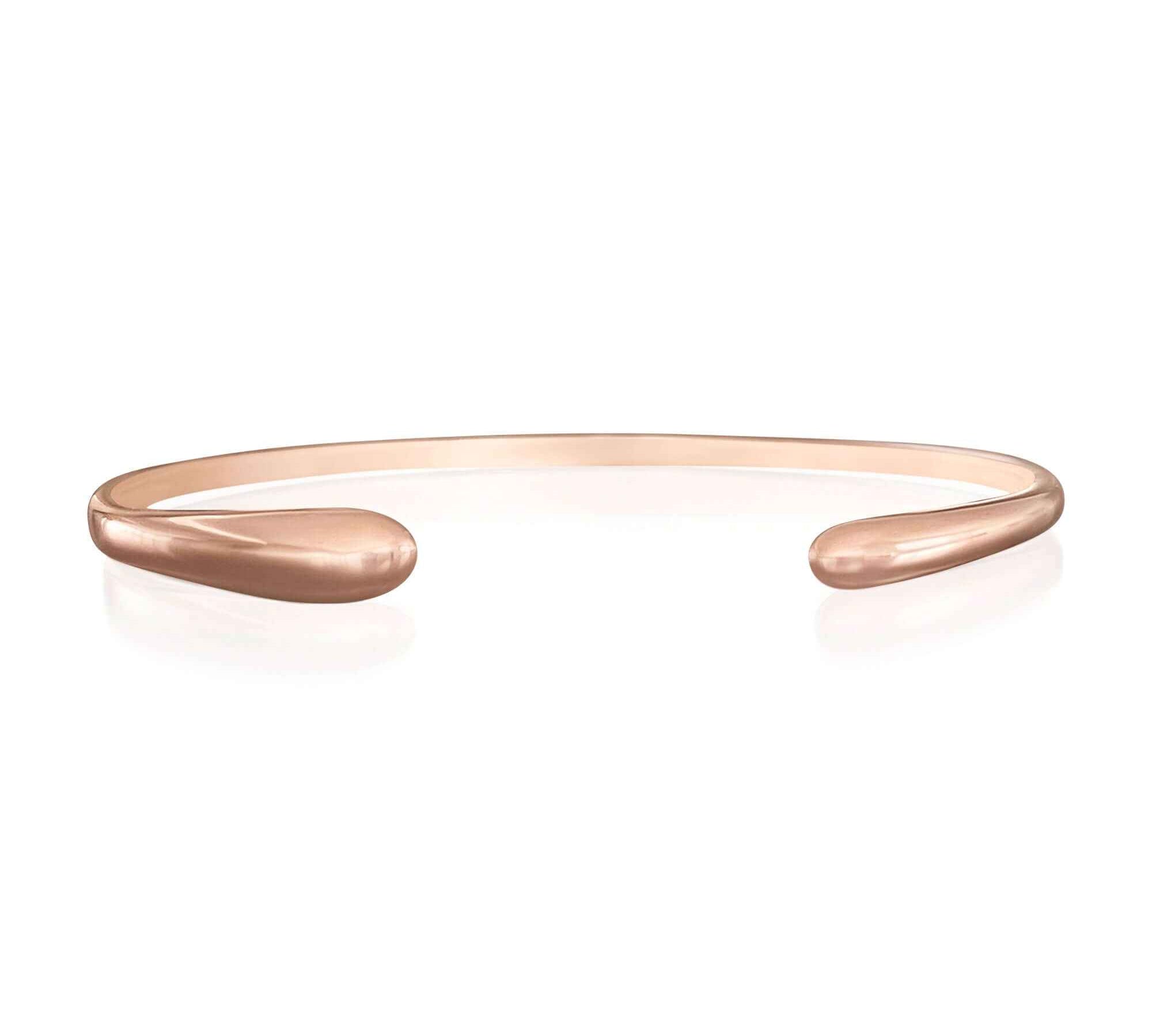 Refined Teardrop Bangle in Rose Gold showcasing a sleek design by Alessandra James.