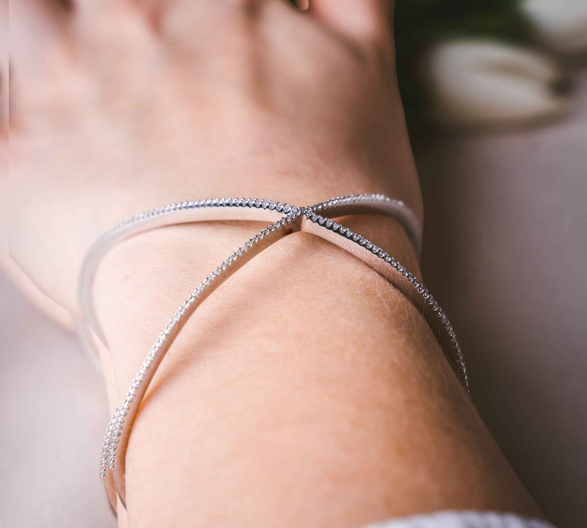 Close-up view of Waverly Cross Silver Bangle for Women.